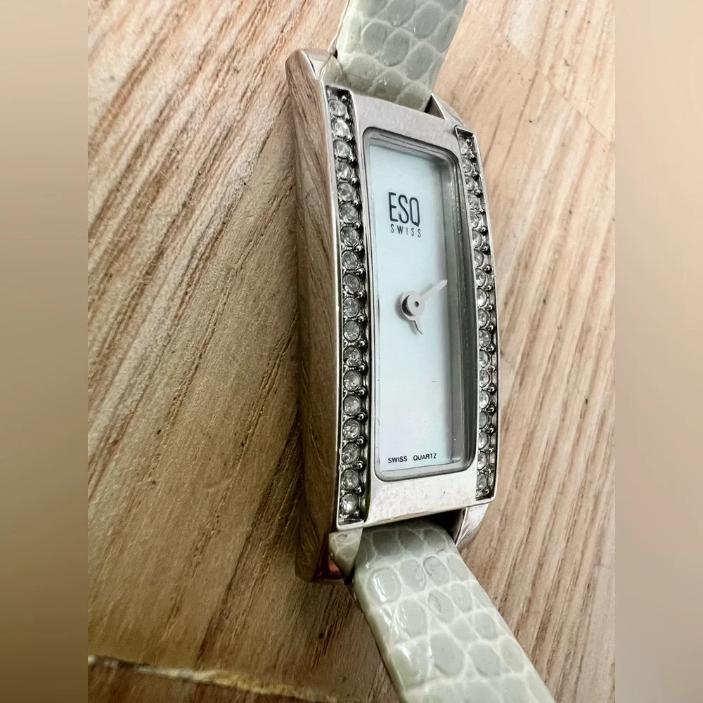 ESQ by Movado ladies skinny silver tone rectangular dress watch NEW BATTERY